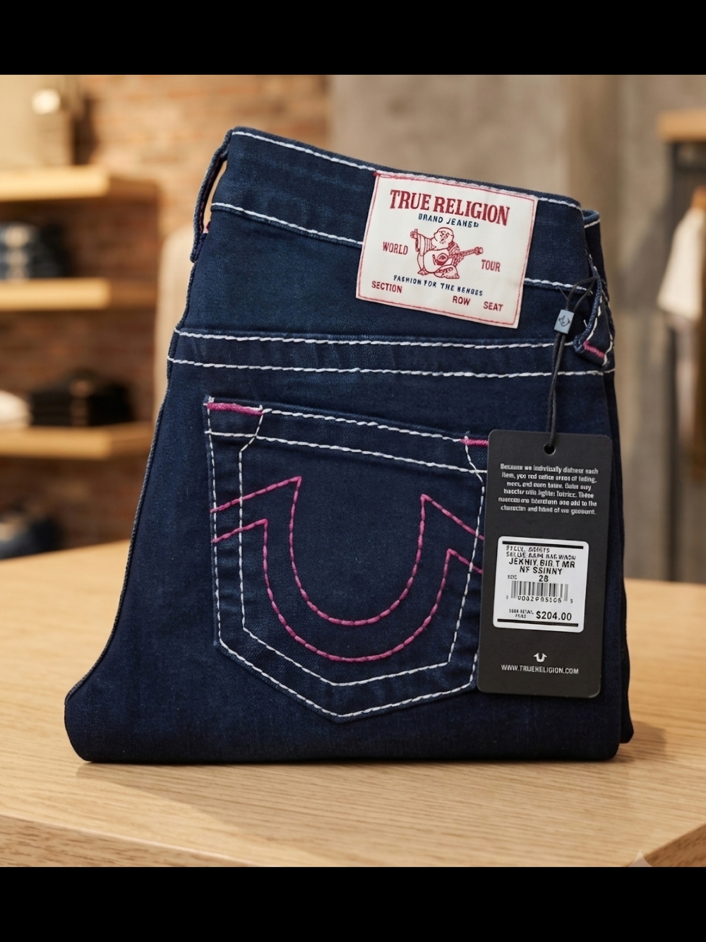 True Religion Dark Blue Boot Cut Jeans with Pink Stitching